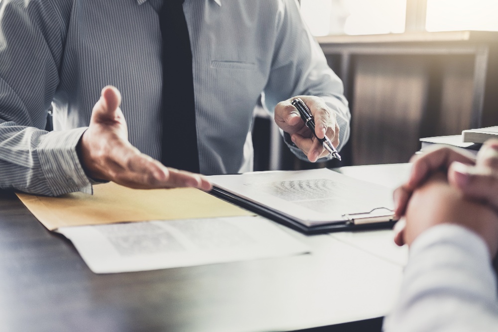 Businessman and Male Lawyer or Judge Consult Having Team Meeting with Client-1