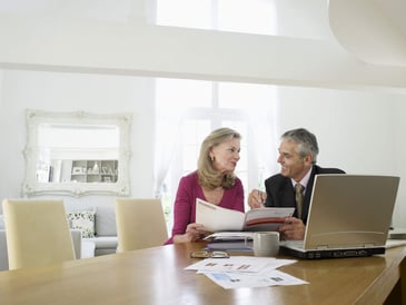 Insurance advisor with client