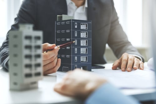 Real estate developer discussing new housing development project